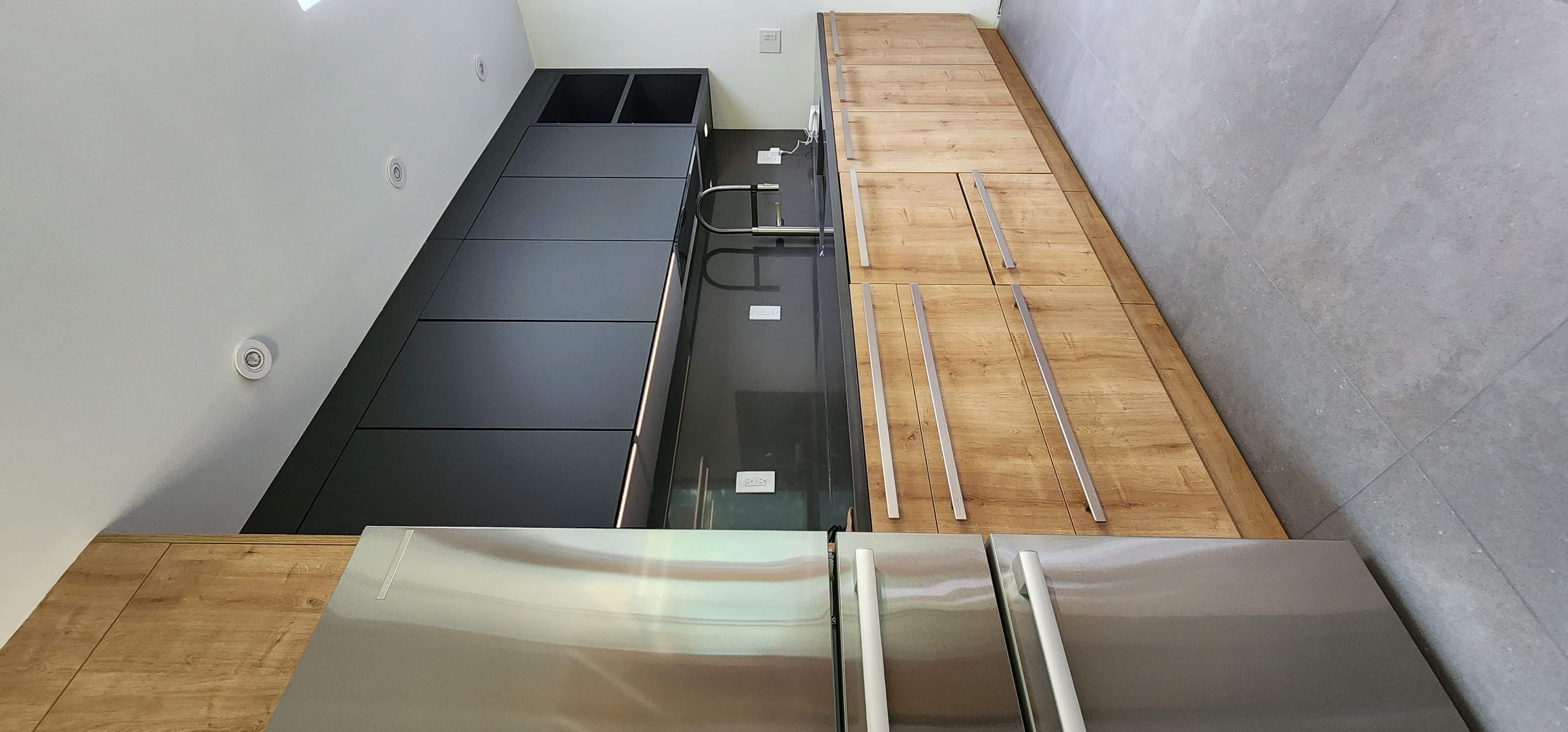 Modern Kitchen with Black Countertops